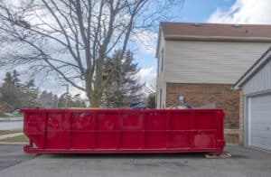 Red Dumpster on Driveway