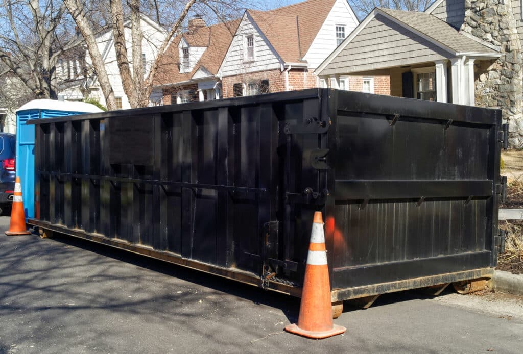 Black industrial dumpster